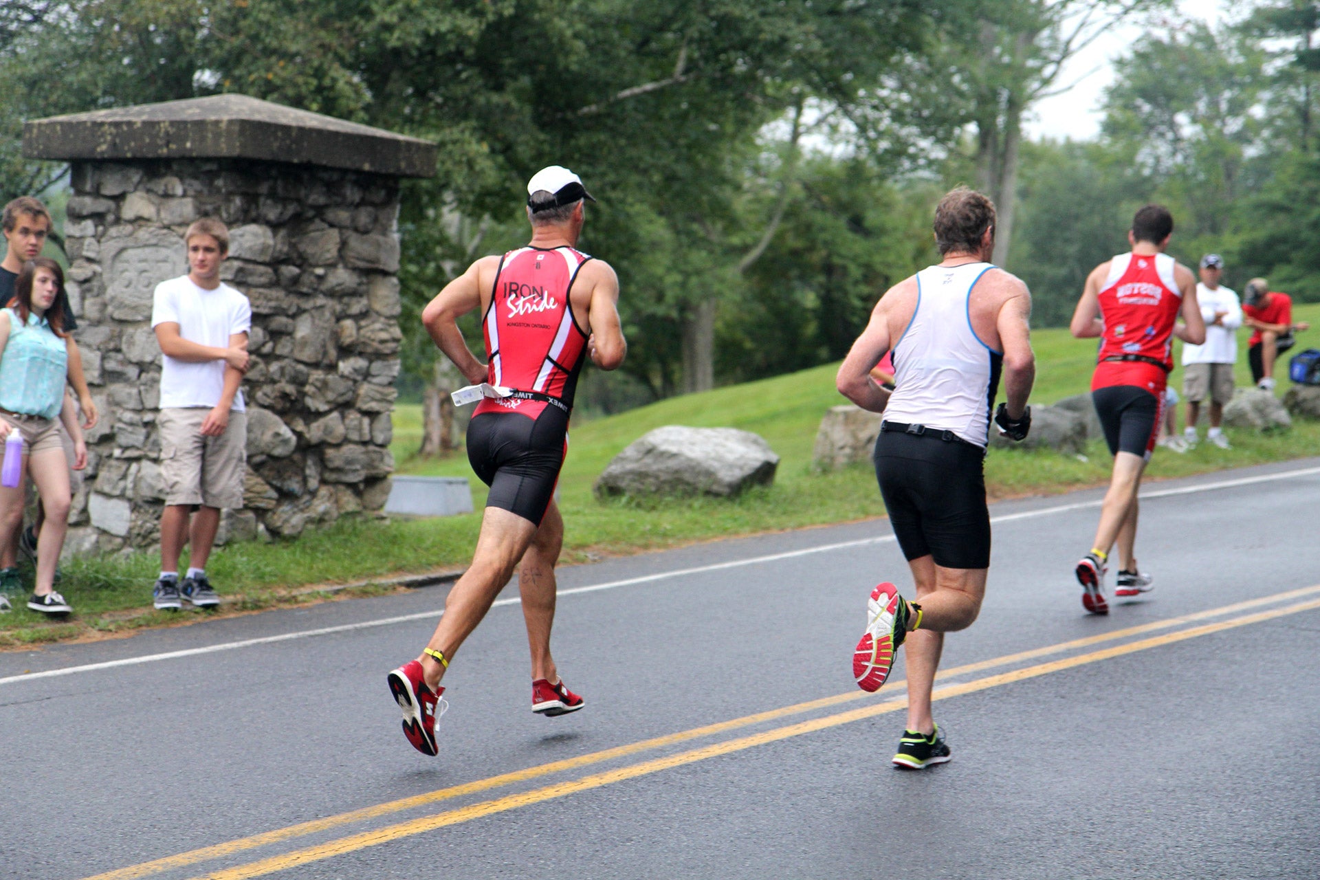 IronStride athletes running in a triathlon