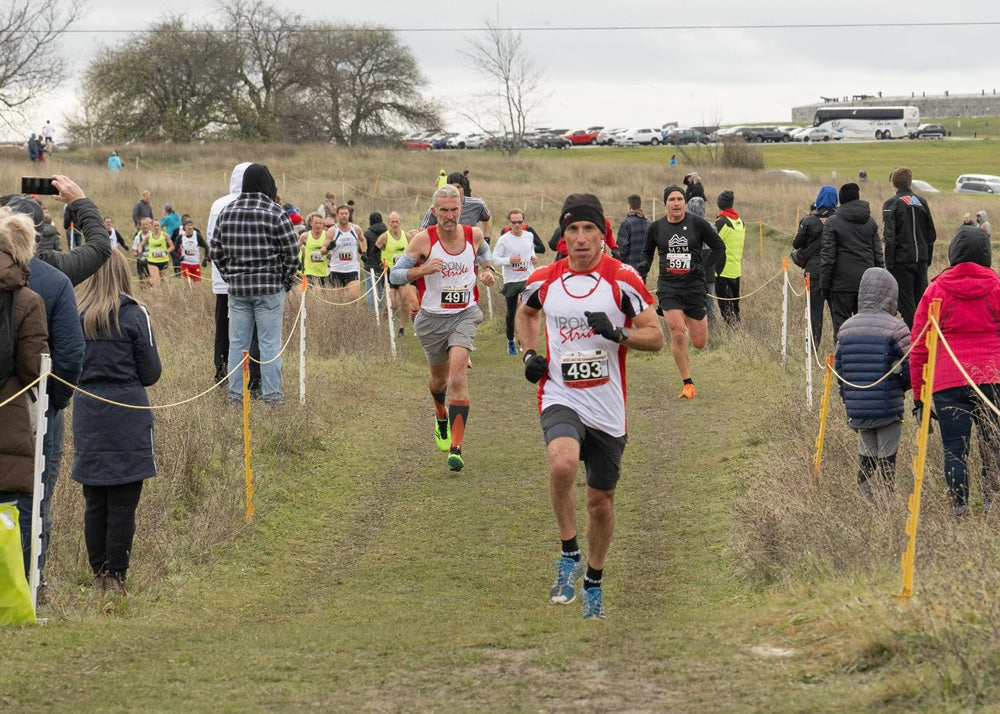 Athletes competing in a cross country race